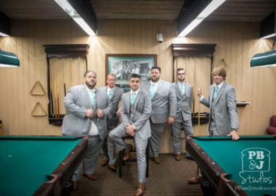 Groomsmen in pool house