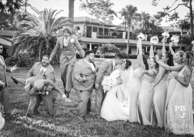 Bride and groom with wedding party BW