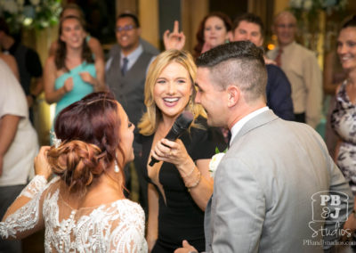 Bride and groom with microphone