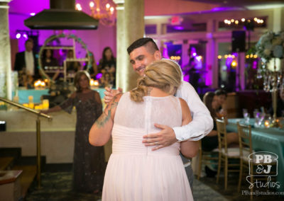 Bride and groom slow dancing