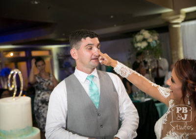 Groom with cake frosting