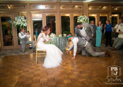 Bride and groom blindfolded