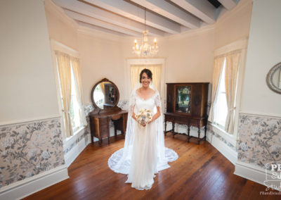 Jocelyn in wedding dress and bouquet