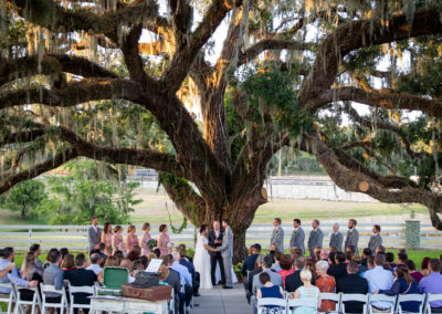 Scott and Jocelyn getting married under big tree