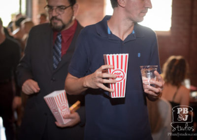 Guests receiving popcorn