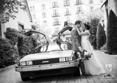 Renette and Todd next to Delorean