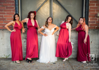 Renette posing with bridesmaids