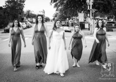 Renette walking down the street with bridesmaids