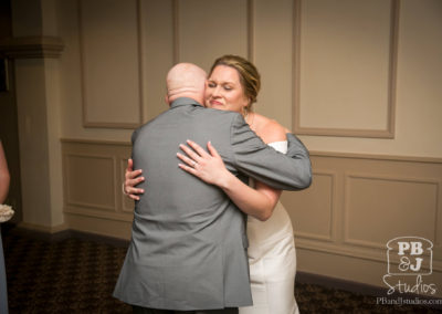 Kate and father hugging