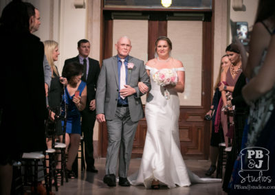 Kate with her father walking down aisle