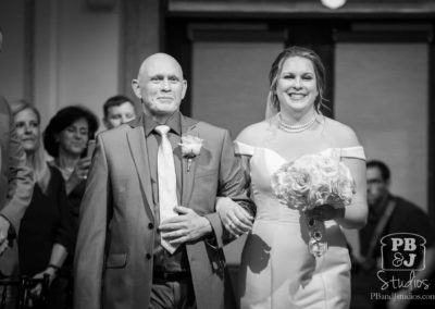 Kate with her father walking down aisle