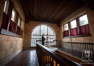 Kate and Steven next to big window