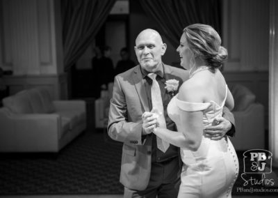 Kate and her father dance