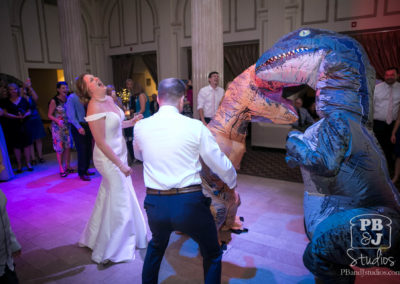 Kate and Steven dancing with dinosaurs